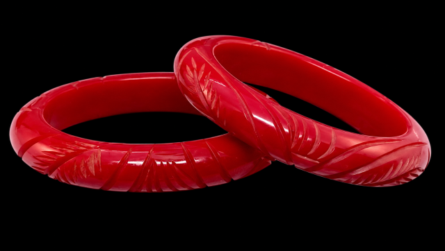 matching pair oval red bakelite bangles